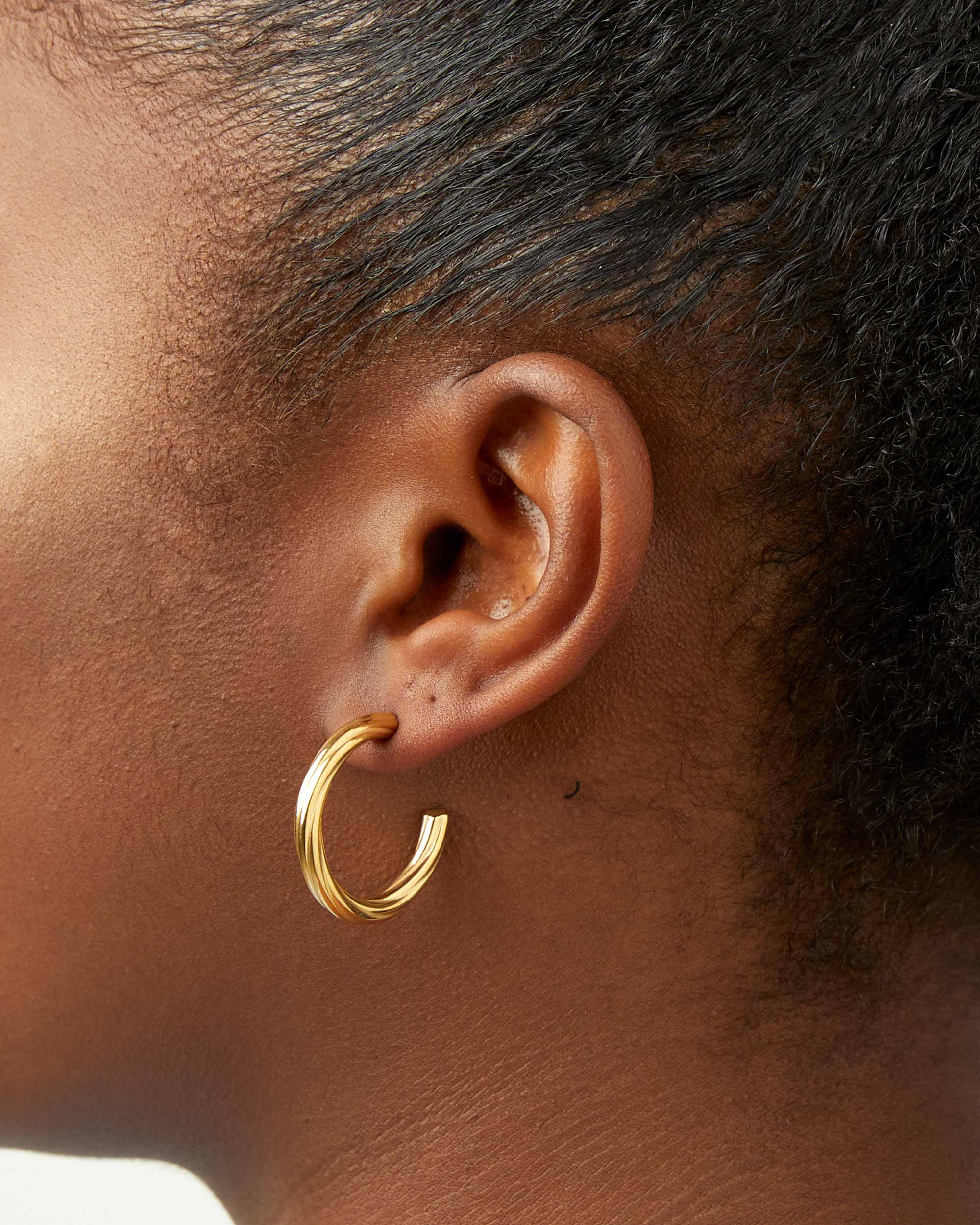 Gold Twisted C Shaped Earrings